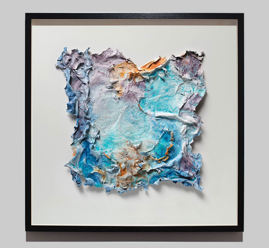 Framed abstract textural work on paper tridimentionally cast by the artist. Mainly turquoise and orange colors. Title: Aurora Vernum (Spring Dawn)