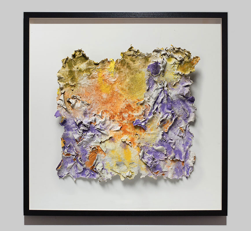 Framed abstract textural work on paper tridimentionally cast by the artist. Mainly yellow, orange, and purple colors. Title: Solstitium (Summer Solstice)