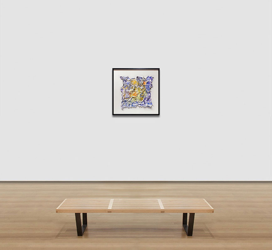 View in a room of an abstract textural work on paper tridimentionally cast by the artist. Mainly yellow and blue colors. Title: Aequinoctium Vernum (Spring Equinox)