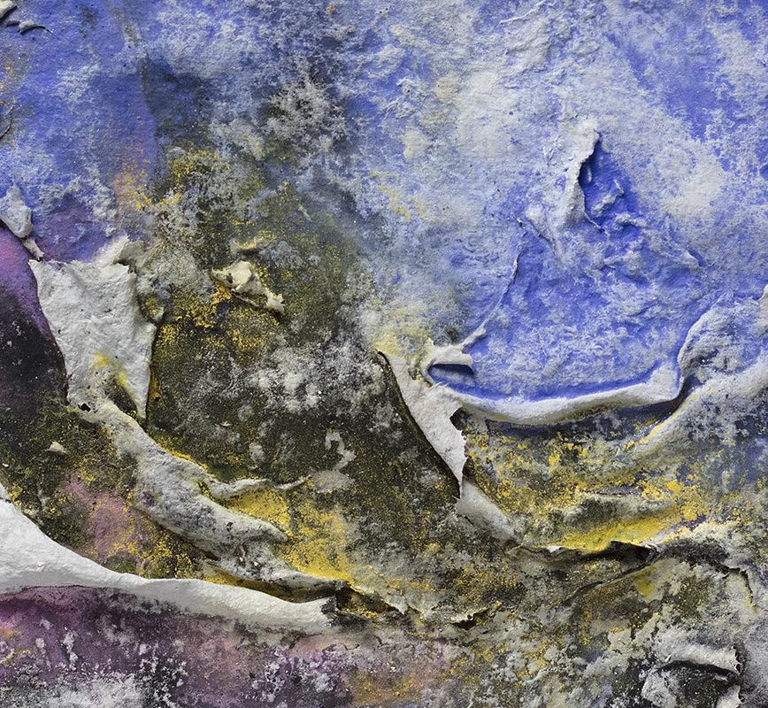 Detail of an abstract textural work on paper tridimentionally cast by the artist. Mainly blue and black colors. Title: Brumalis Dies (Winter Solstice)